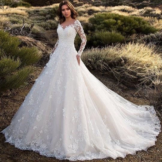Wedding Dresses With Feather Embellishments 